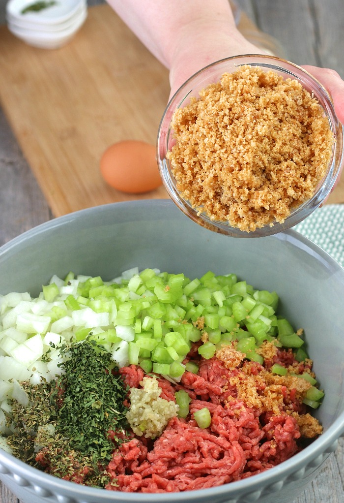 Here we see more seasonings being added to the bowl with the keto meatloaf recipe ingredients. 