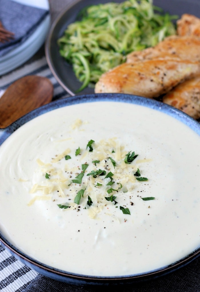 The finished keto sauces look almost too good to eat, here we see the keto alfredo sauce in a bowl ready to be served. 