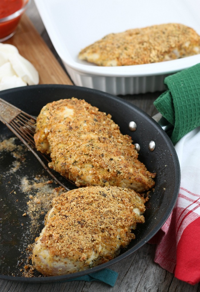 This image shows the keto chicken parmesan being fried up in a pan.