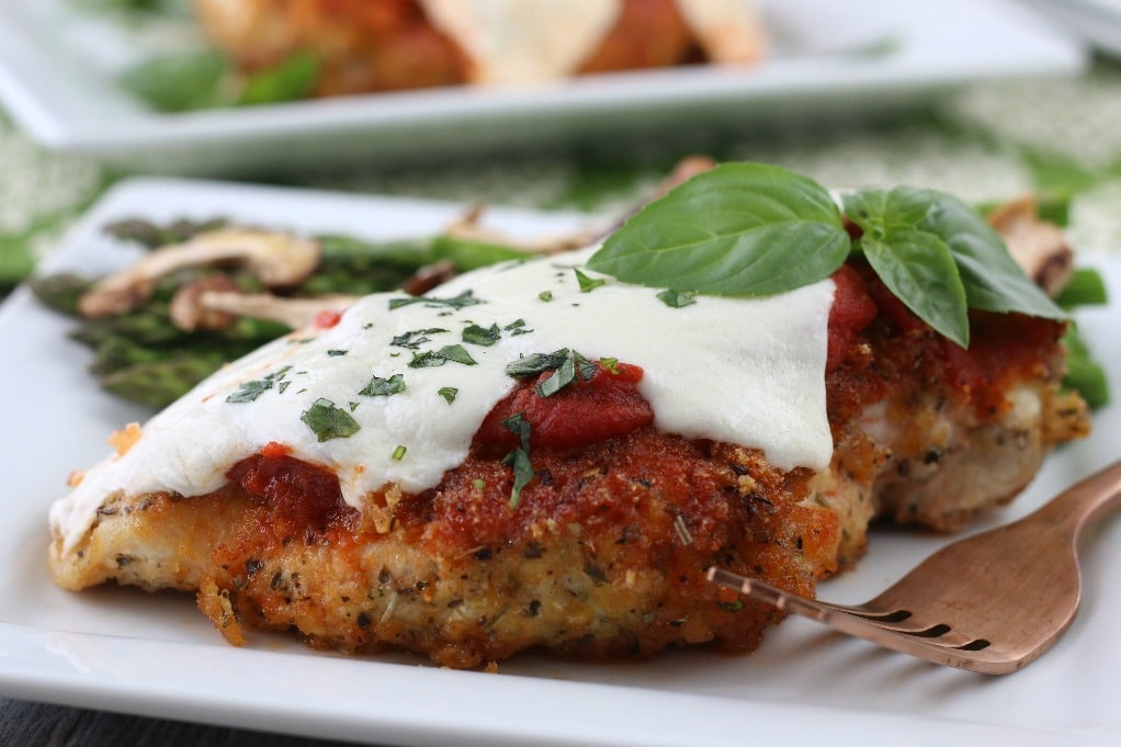 A horizontal view of the finished keto parmesan crusted chicken. 