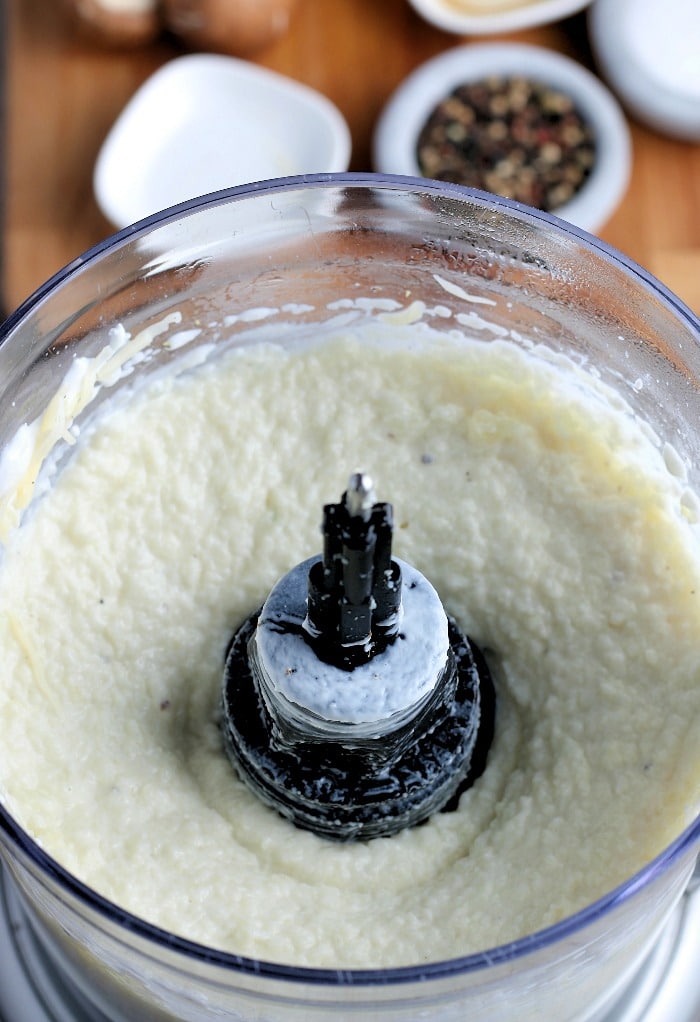 The smooth creamy mixture for the cauliflower base of our shepherds pie is easy to make thanks to the food processor!