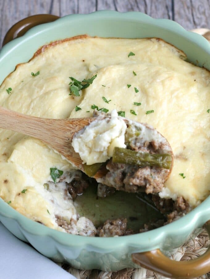 A spoonful of the cauliflower shepherds pie ready to be served.