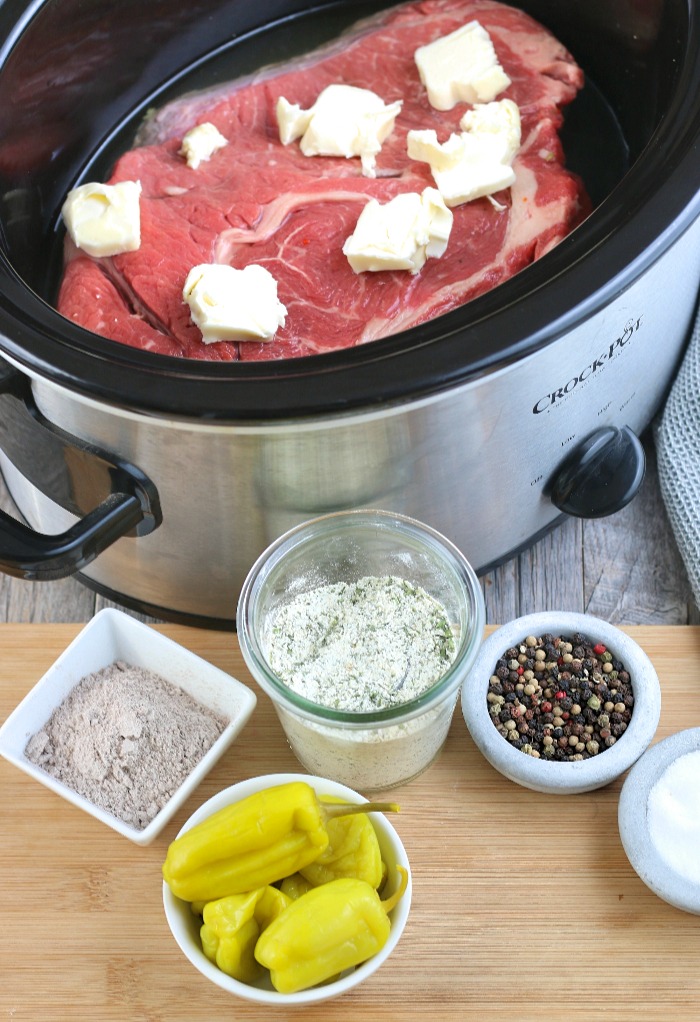We start adding the ingredients to the recipe for Mississippi roast into the crockpot.