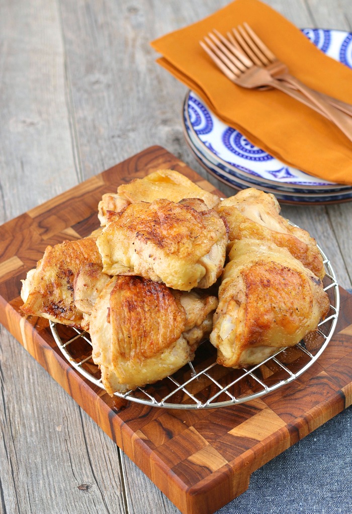 This image shows the low carb chicken thigh recipes next to the plates ready to be served up! 