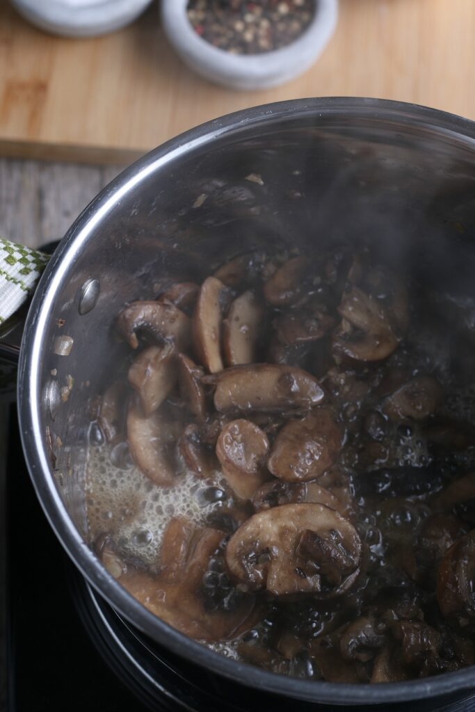 The mushroom gravy starts to look more like a sauce as the mushrooms cook down! 