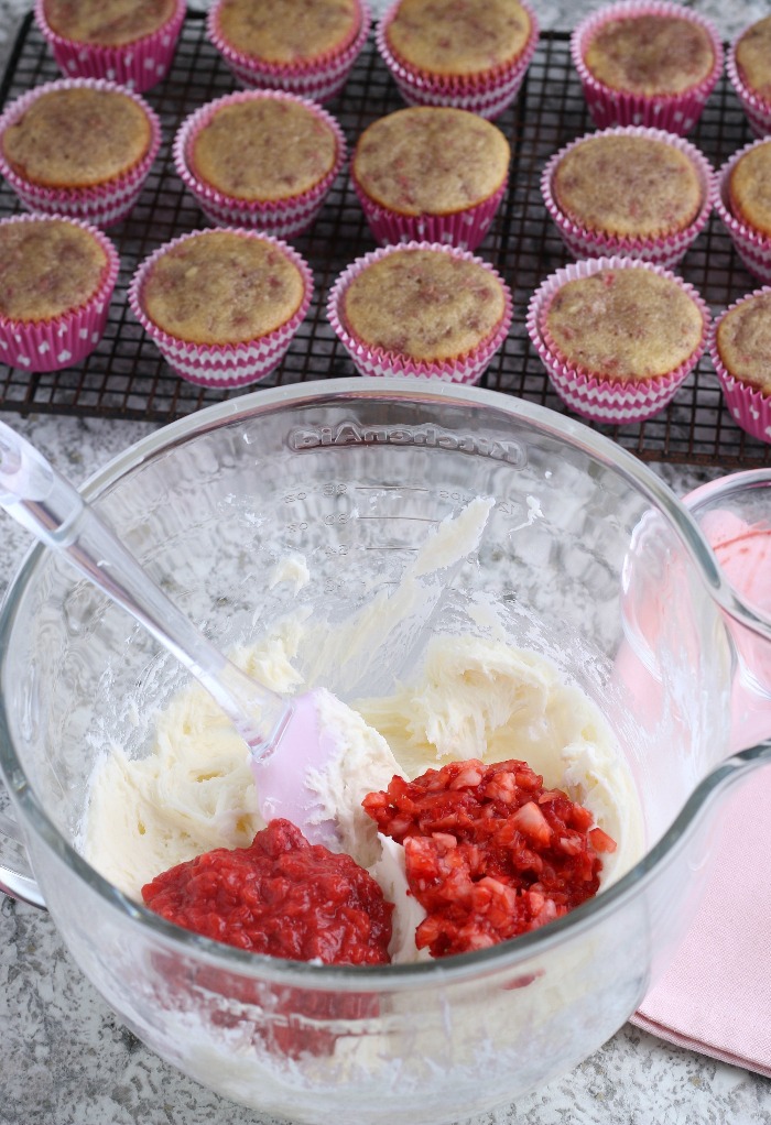 Fresh strawberries mixed into buttercream frosting