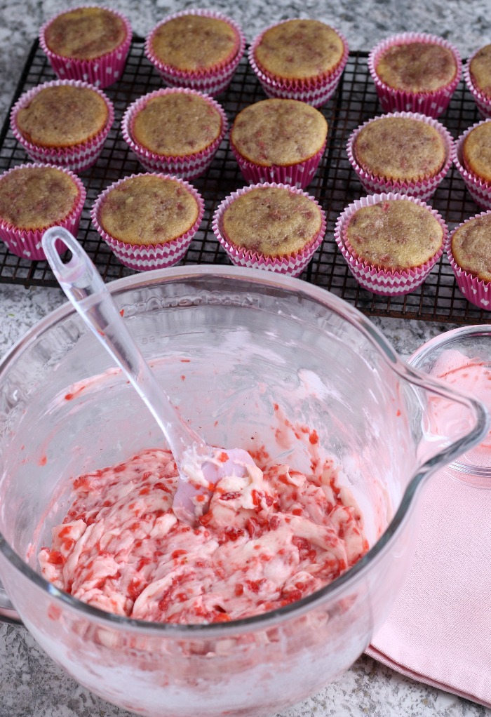 Mixed buttercream frosting with fresh strawberries