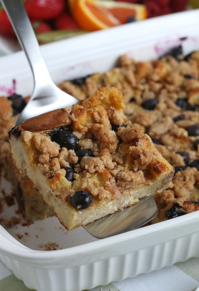 Here we see one serving of the french toast bake on a spatula ready to be put on a plate and topped with delicious blueberries!