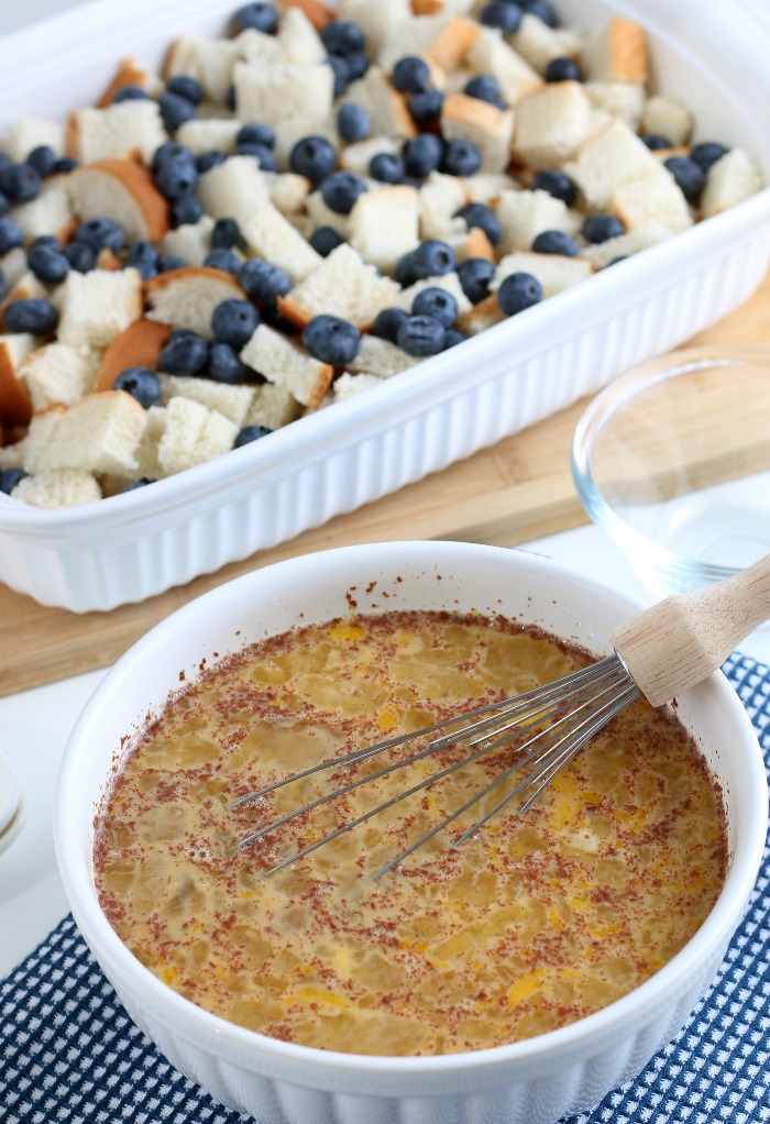 The seasoned eggs are beaten and ready to be poured over the bread for our blueberry french toast casserole.