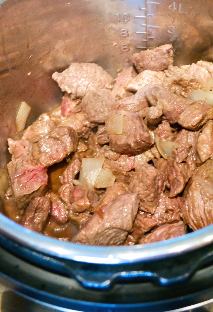 Browning the beef for the beef vegetable soup