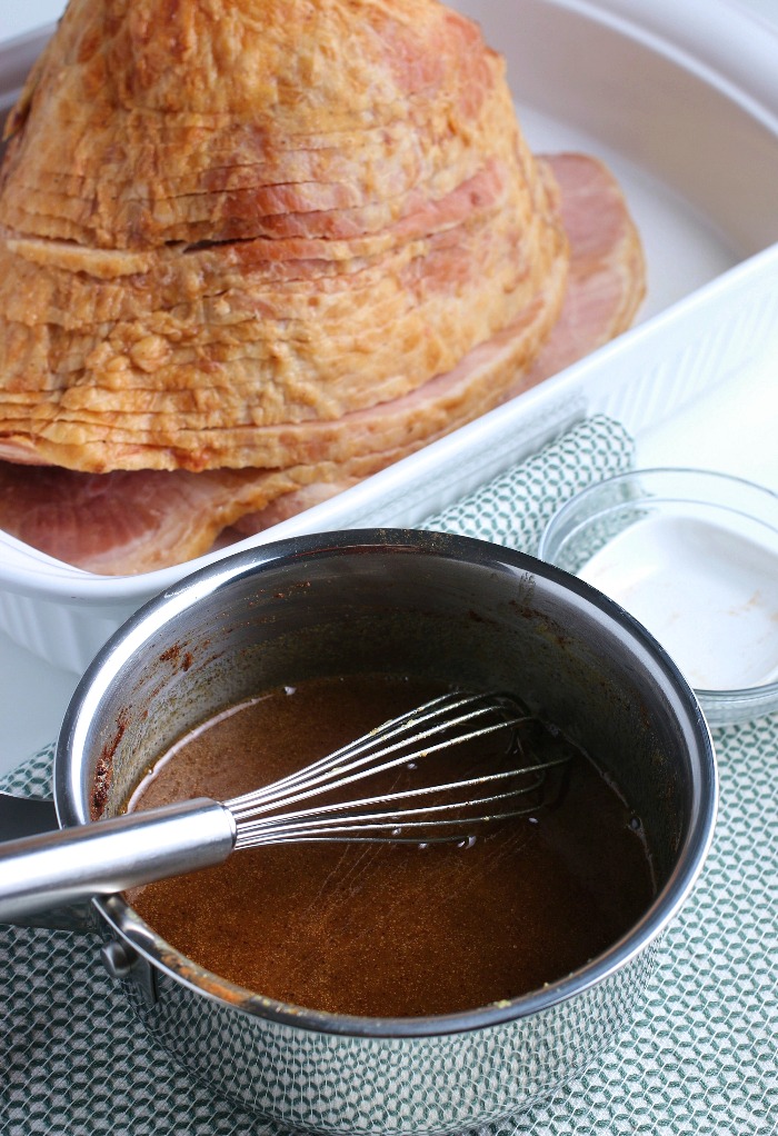 Here we see the glaze being whisked in a pot and ready to be poured over our delicious ham! 