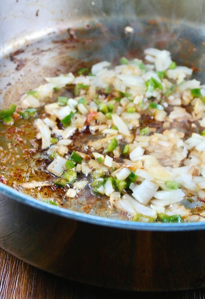 Add onion and paper to skillet and cook until tender