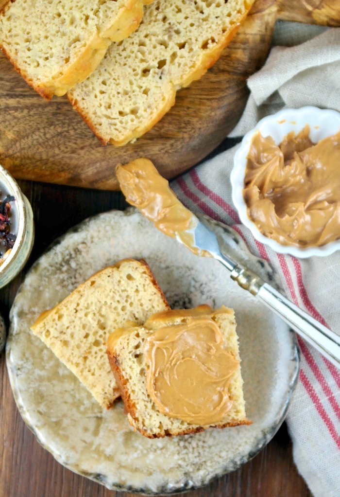 Overhead shot of slices of banana bread with peanut butter