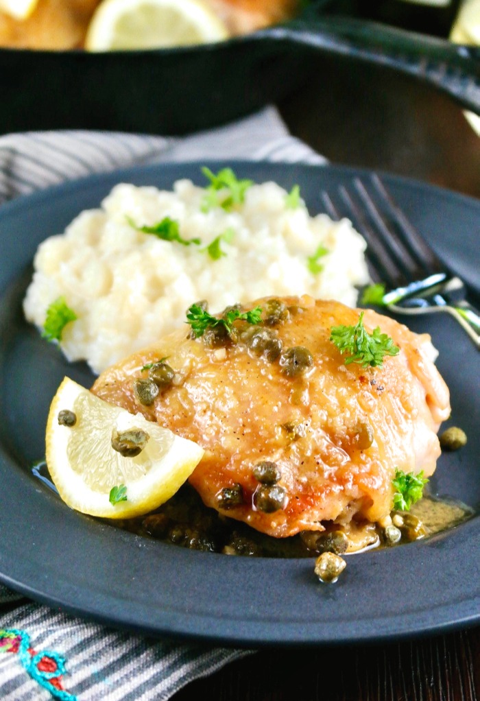 Dinner plate of chicken piccata with mashed cauliflower