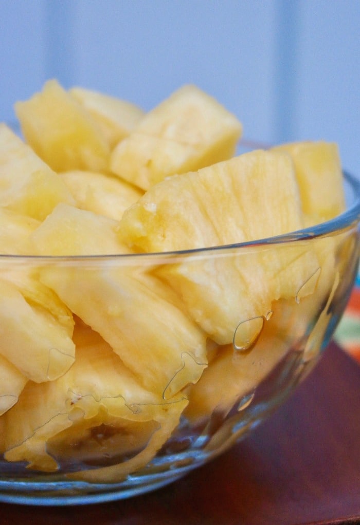 Chunks of pineapple in a clear bowl