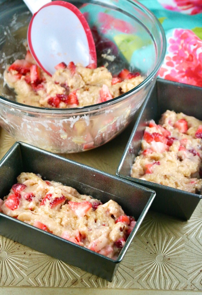 Scoop strawberry bread batter into baking pans