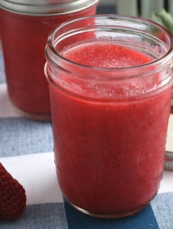 Sugar free strawberry freezer jam in a mason jar.