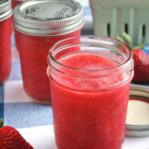 A closer look at the jar bull of strawberry freezer jam recipe finished and ready to be shared.