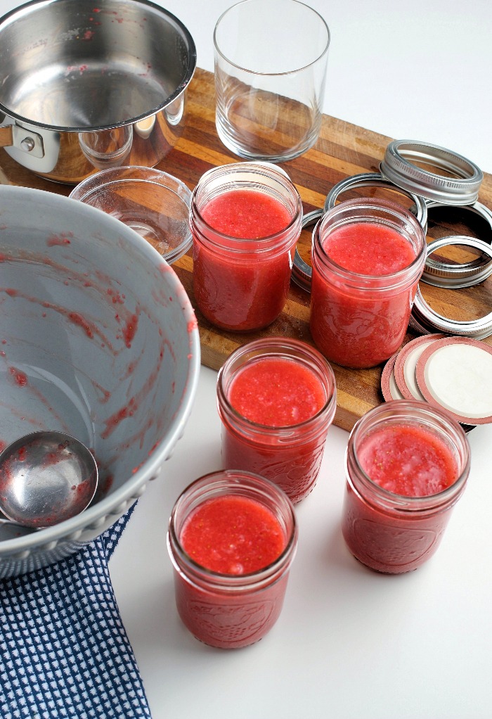 Here we see the strawberry jam in jars ready for the freezer!