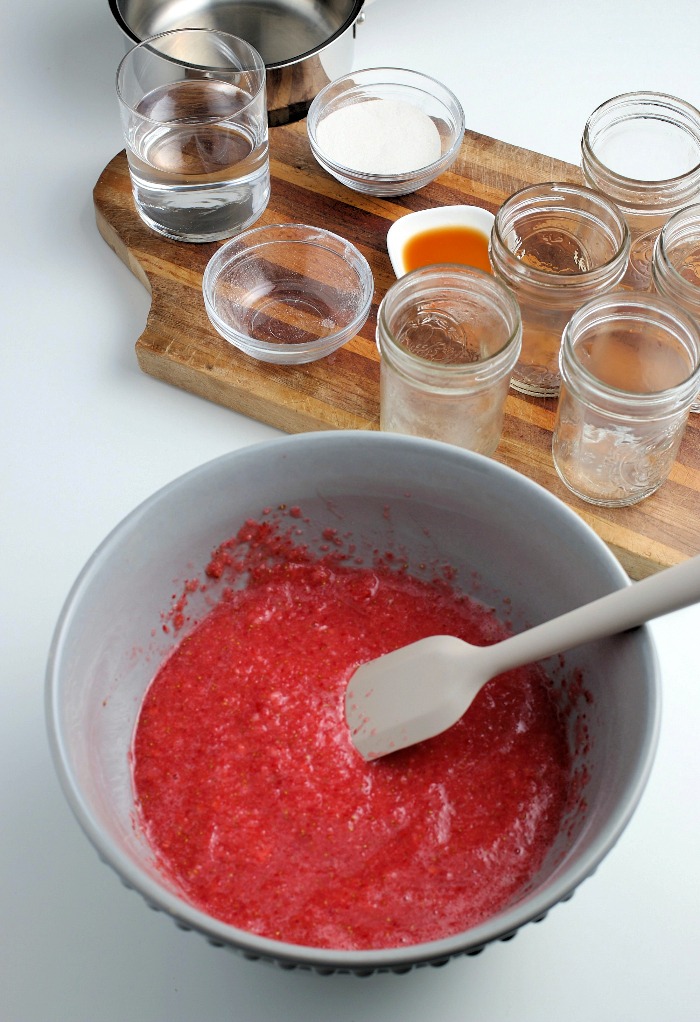 The mixture is stirred up before it can be added to jars.