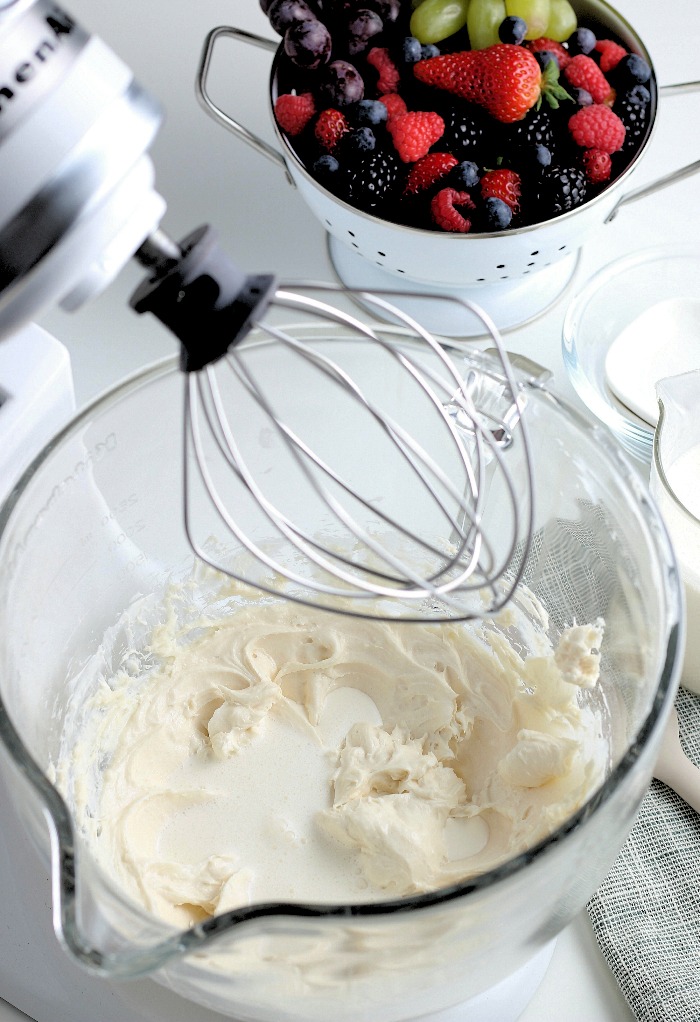 Here we see the whisk attachment being used so we can create a creamy and delicious fruit dip. 