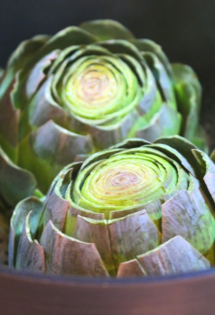Freshly cut globe artichokes