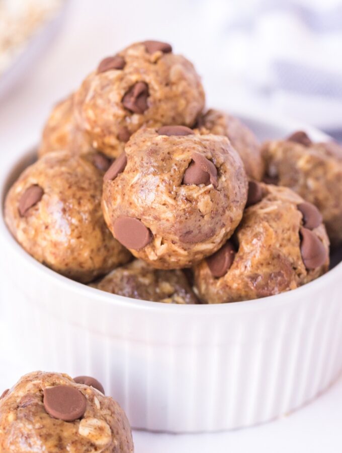 Peanut Butter Balls in a white bowl ready to eat.