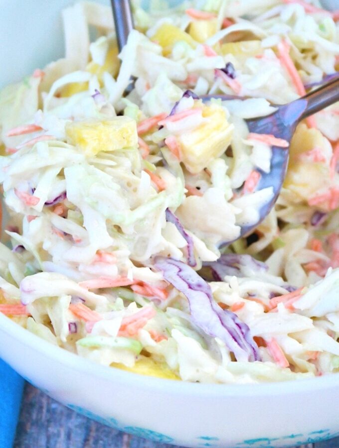 Pineapple coleslaw in a white bowl ready to be served.