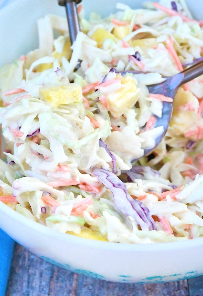Pineapple coleslaw in a white bowl ready to be served.