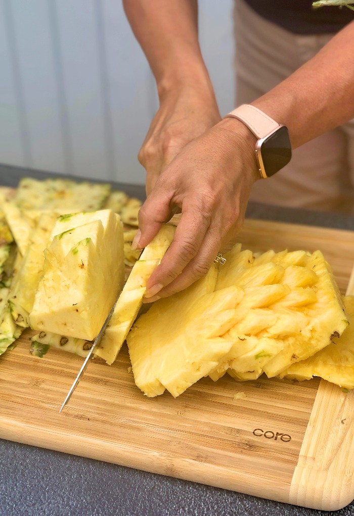 Slice pineapple on its side into rings