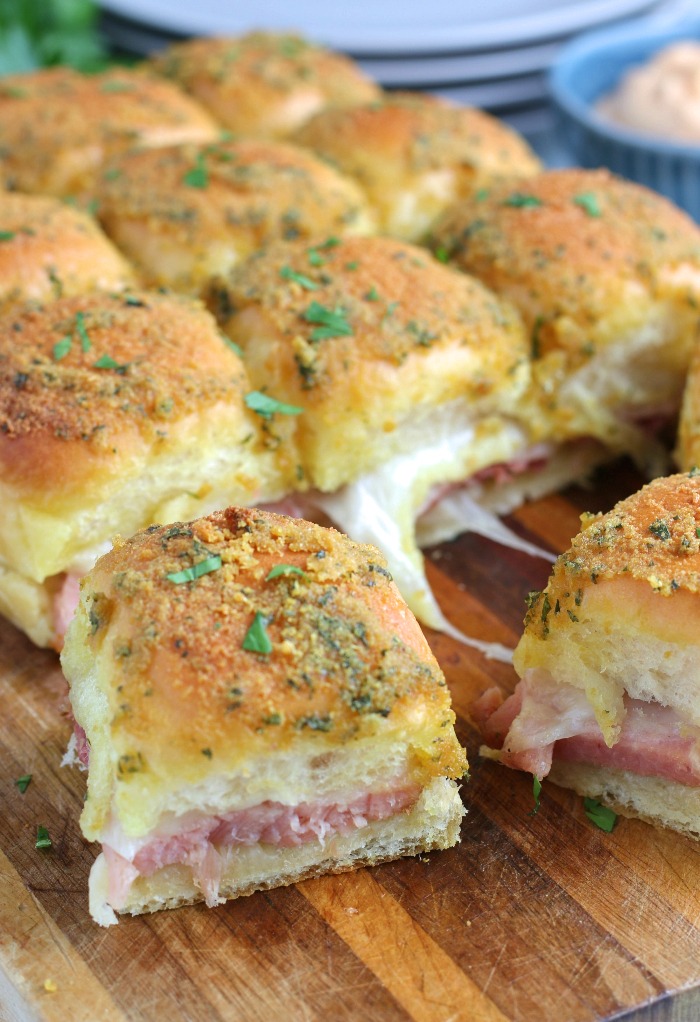 Ham and Cheese Sliders Topped With Butter Sauce | The Foodie Affair