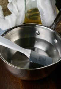 Simple syrup in a sauce pan for limoncello recipe