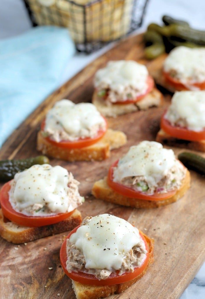 Tuna on toast topped with tomato and melted cheese