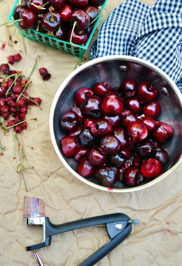 Pitted cherries in a saucepan ready to be cooked into a compote