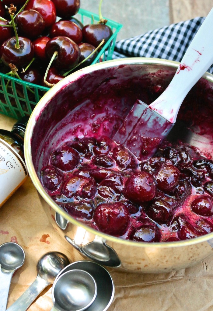 Homemade cherry compote ready to add almond extract. 