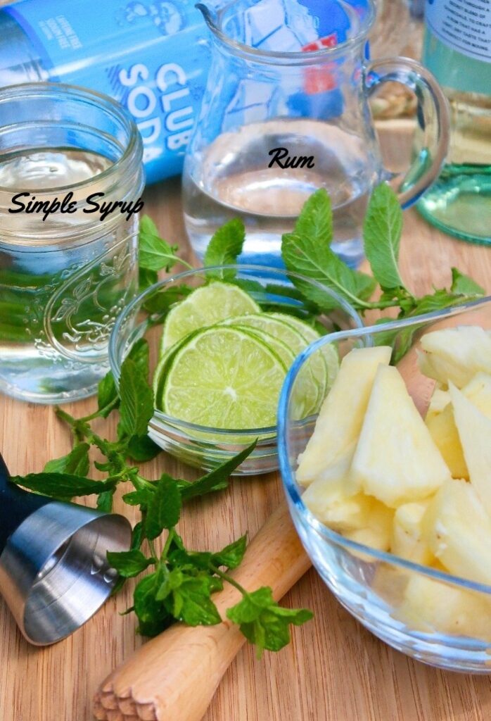 Ingredients to make a pineapple mojito
