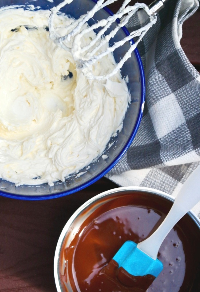 Whipped cream cheese with sweetener and melted chocolate for cheesecake