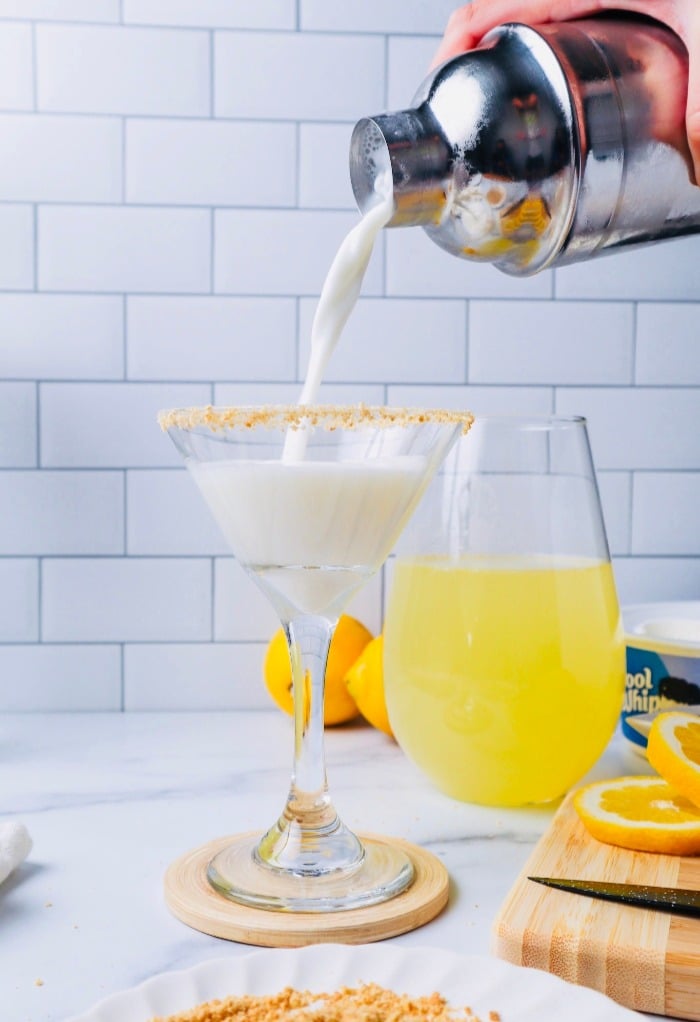 Mix ingredients and pour in prepared martini glass