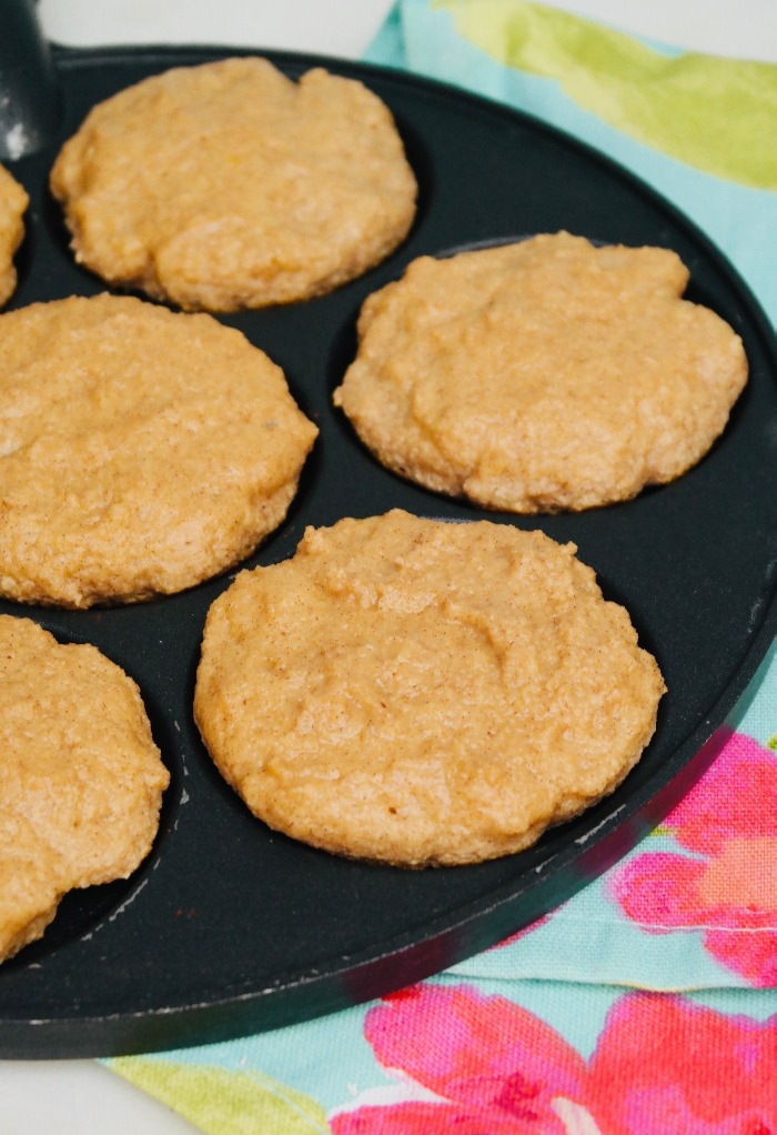 Cooking small batch pancakes on a skillet.