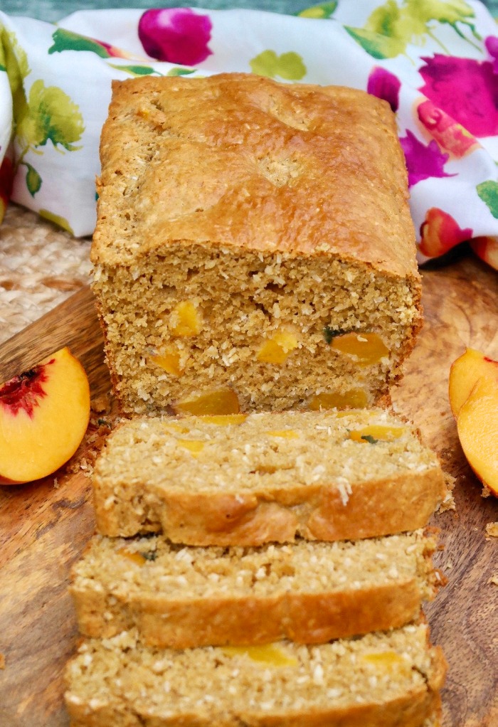 Homemade peach bread on a cutting board 