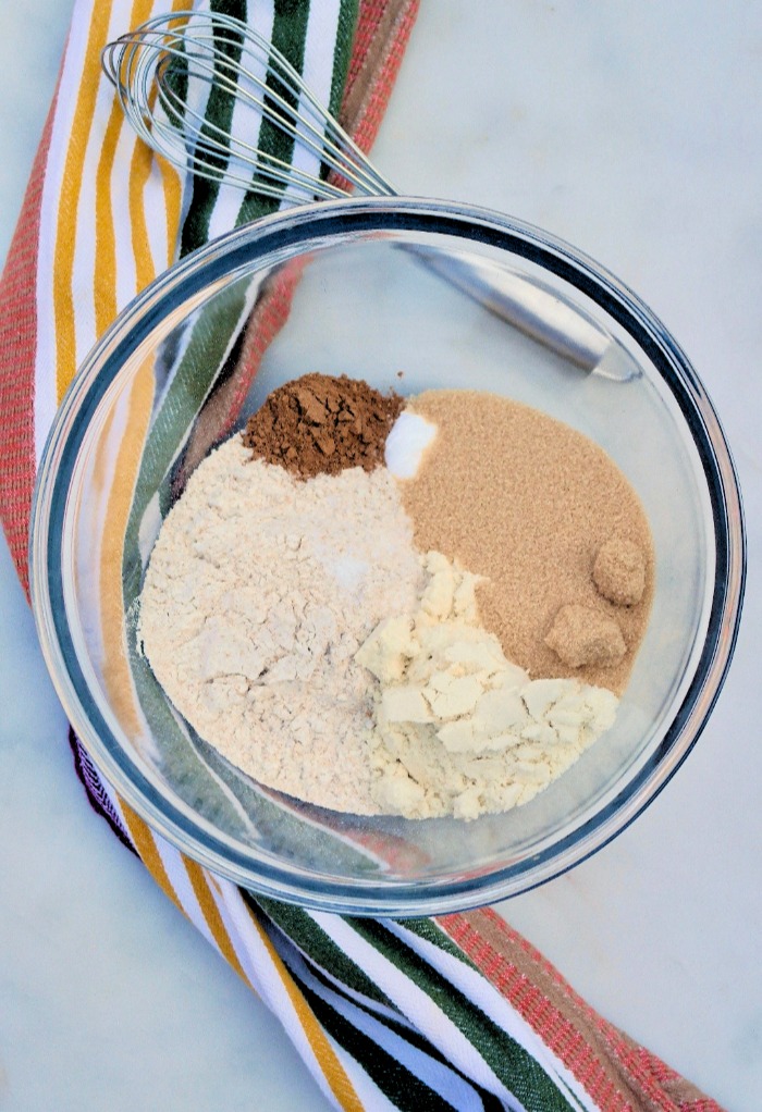 Overhead view of dry ingredients for pumpkin muffins.