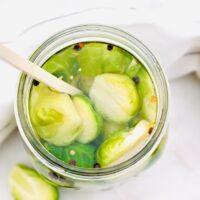 Top view of picked vegetables in a Mason jar.