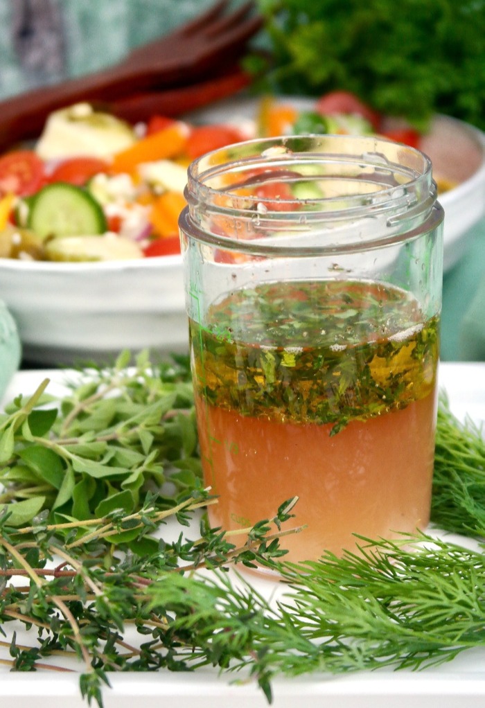 Fresh herbs in a Greek salad dressing. 