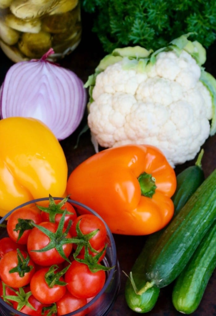 Ingredients to make a fresh cauliflower rice salad.