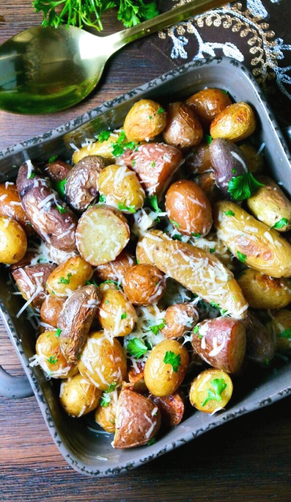 A top view of potatoes in a gray serving dish ready to be served. 