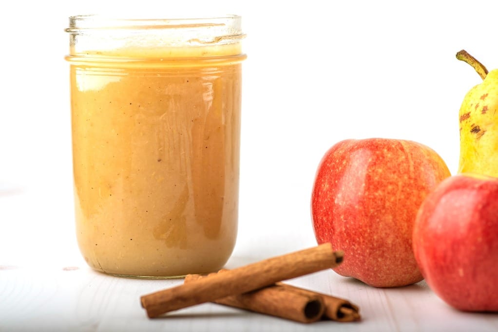 Homemade applesauce in a Mason jar.