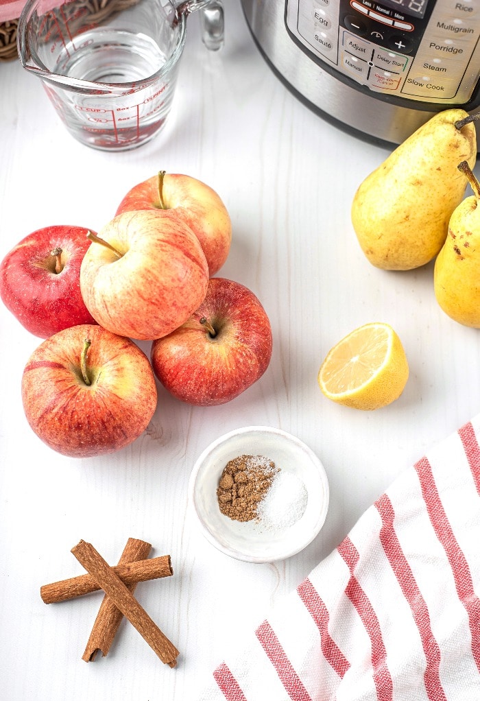 All the ingredients needed to make applesauce in an Instant Pot.