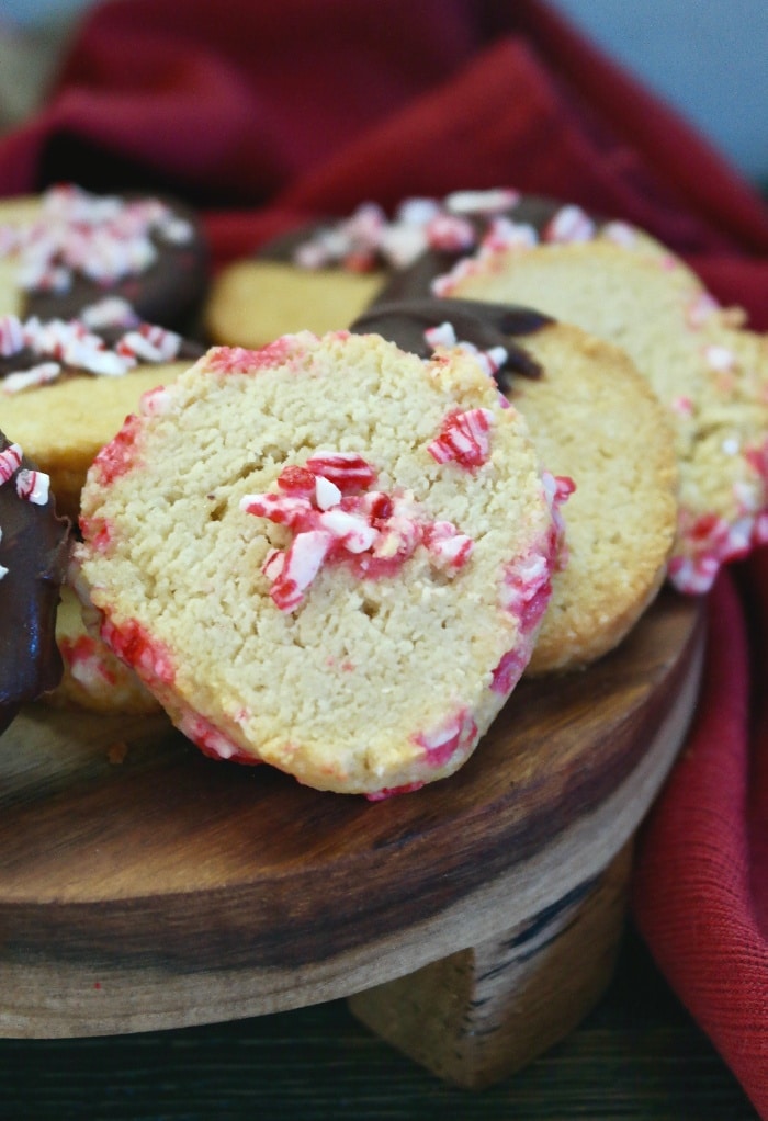Peppermint cookies on a wood plate. 
