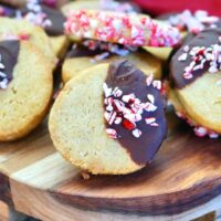 Sliced Christmas cookies on a wooden tray ready to eat.