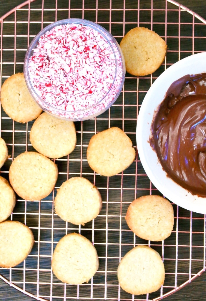 Baked cookies ready to be dipped in chocolate. 